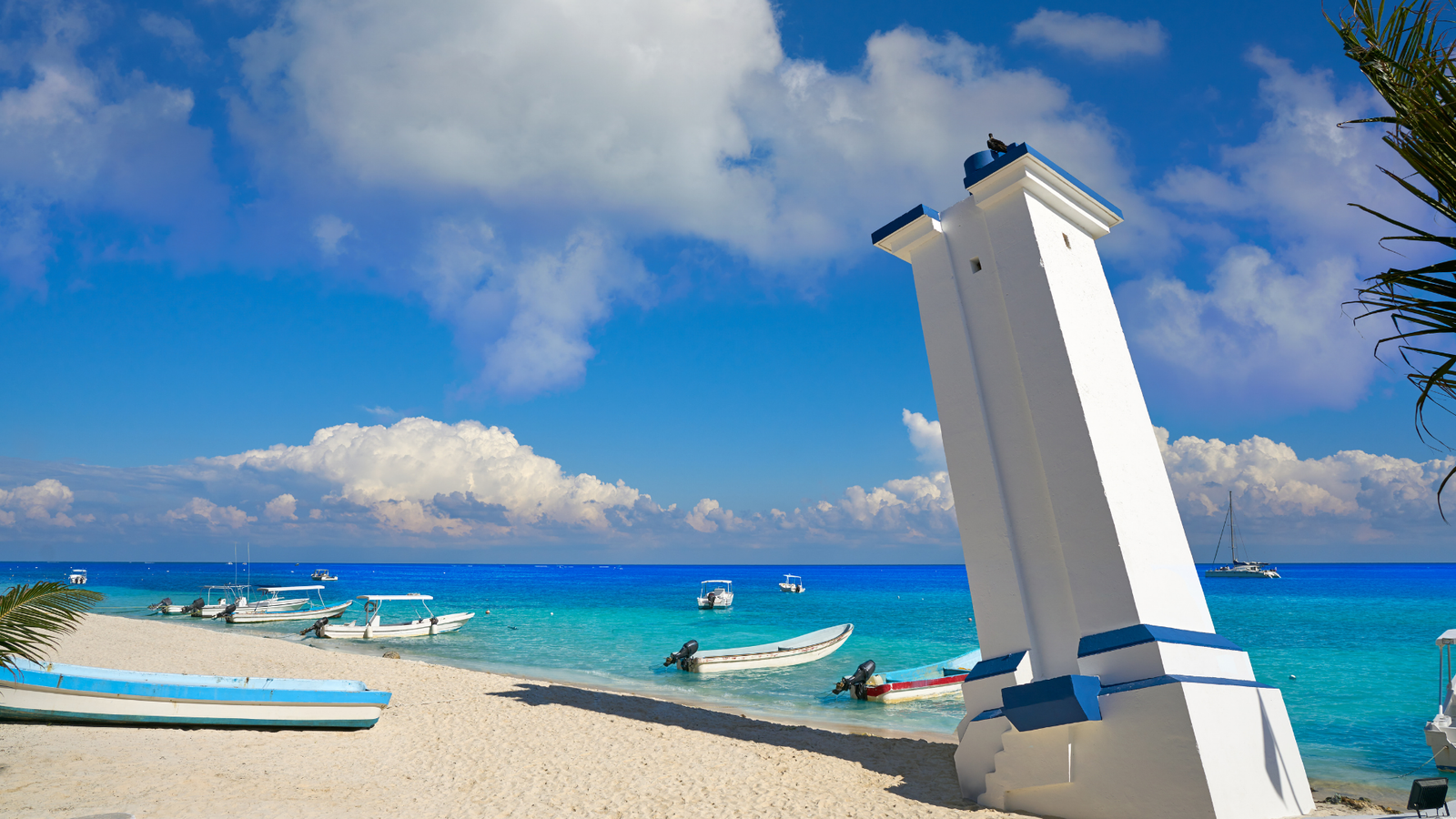 Puerto Morelos beach and iconic leaning lighthouse in the Riviera Maya