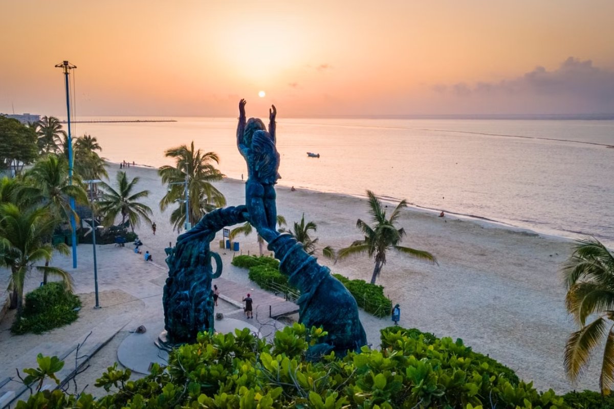 Portal Maya sculpture at sunset in Playa del Carmen